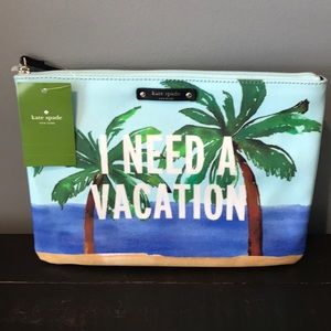 Kate Spade “I need a vacation” clutch bag